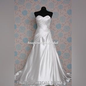 Brand new with tags Cosmobella wedding dress